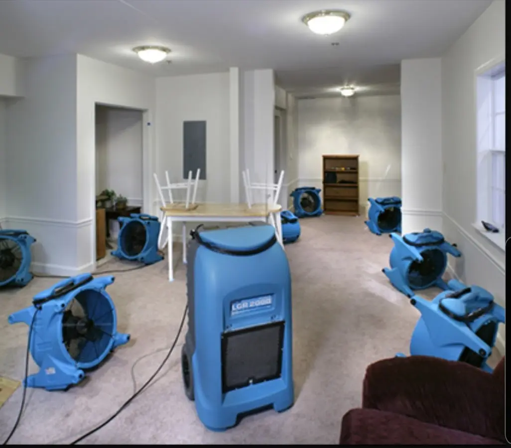 Air movers and dehumidifier setup for Water Damage Restoration in Mission